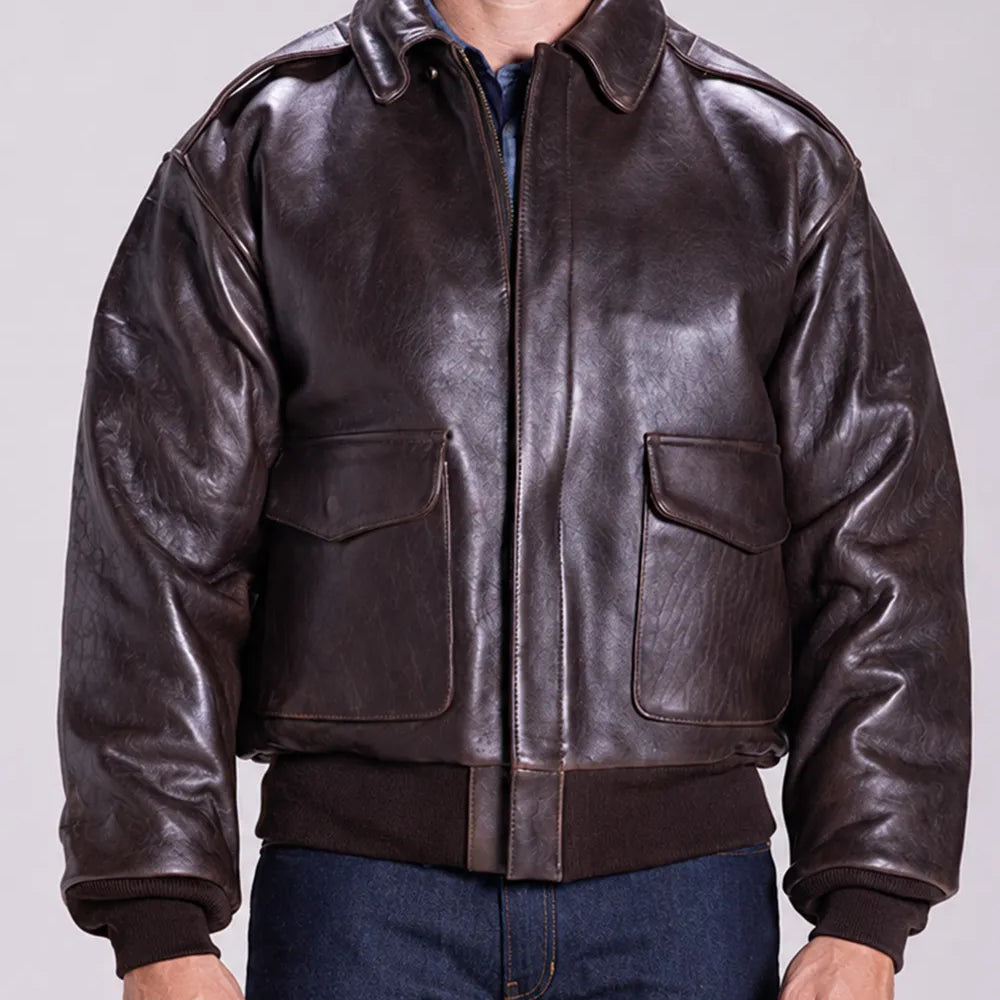 Front view of a men's A-2 leather flight jacket featuring genuine cowhide leather, flap pockets, and a vintage brown bomber design.