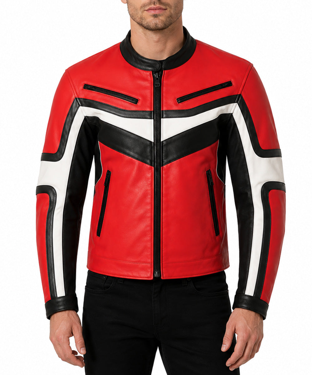 A man wearing a red, black, and white leather jacket with a chevron pattern, paired with black pants, against a plain white background.