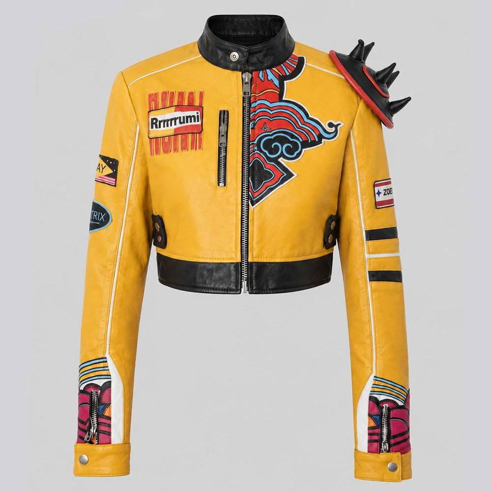 Rumi Kpop Demon Hunters Jacket front view in premium yellow leather with cropped racing style and graphic patches.