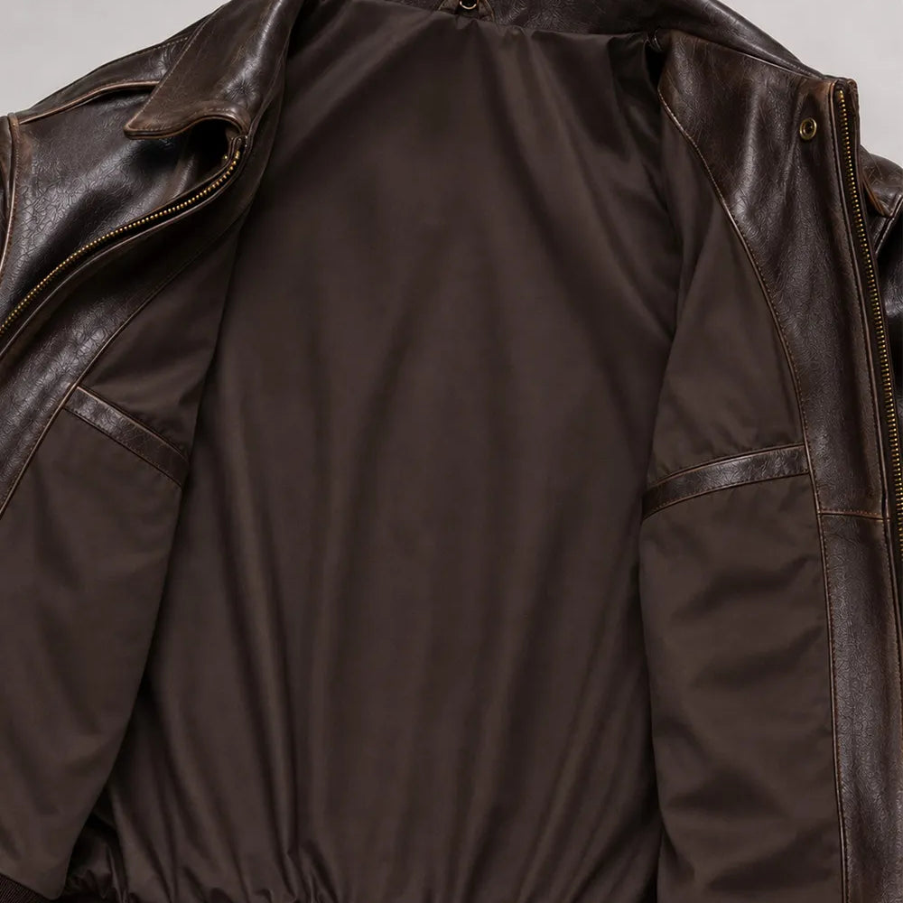 Genuine cowhide leather flight jacket in dark brown featuring a timeless A-2 bomber silhouette for everyday and outdoor wear.