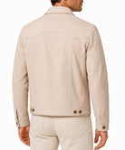 A man shown from the back wearing a light beige suede or nubuck jacket with matching beige trousers, photographed against a clean white background.