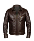 A dark brown leather jacket with a front zipper, a zippered chest pocket, and a pointed collar, shown against a plain white background.
