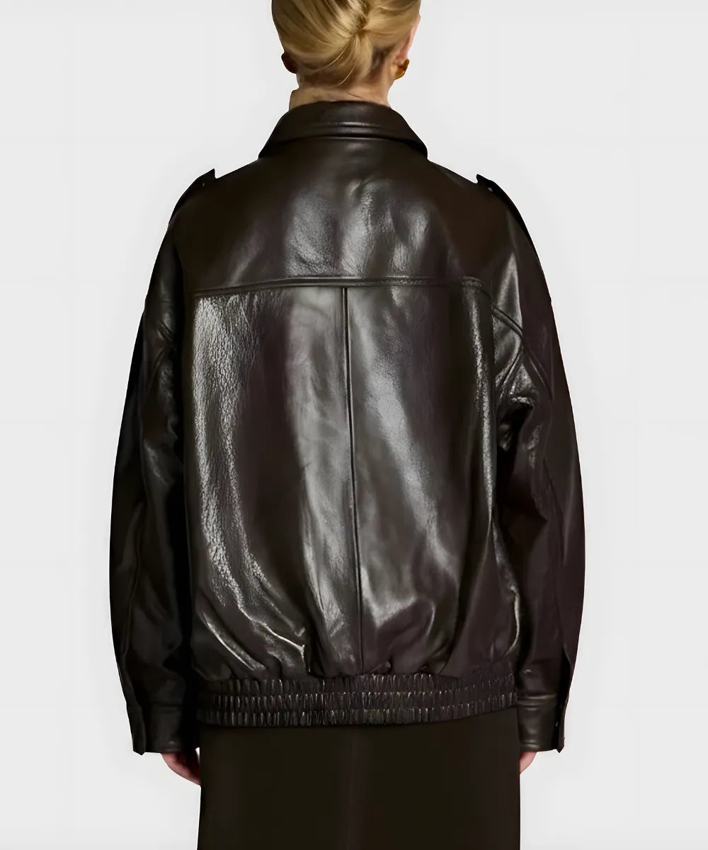 Person wearing a black leather jacket on a white background