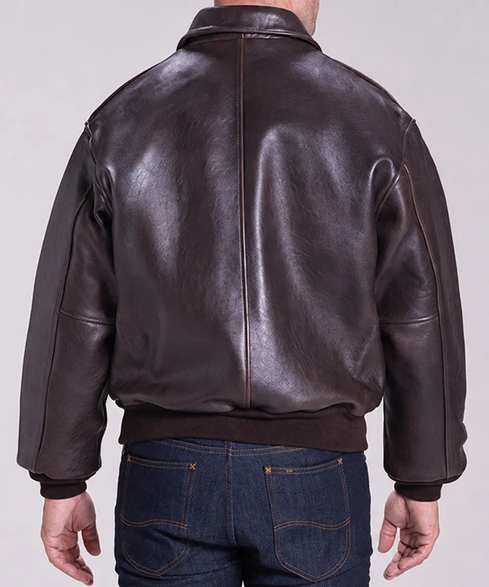 Brown leather flight bomber jacket crafted from genuine cowhide leather with a classic military-inspired A-2 design