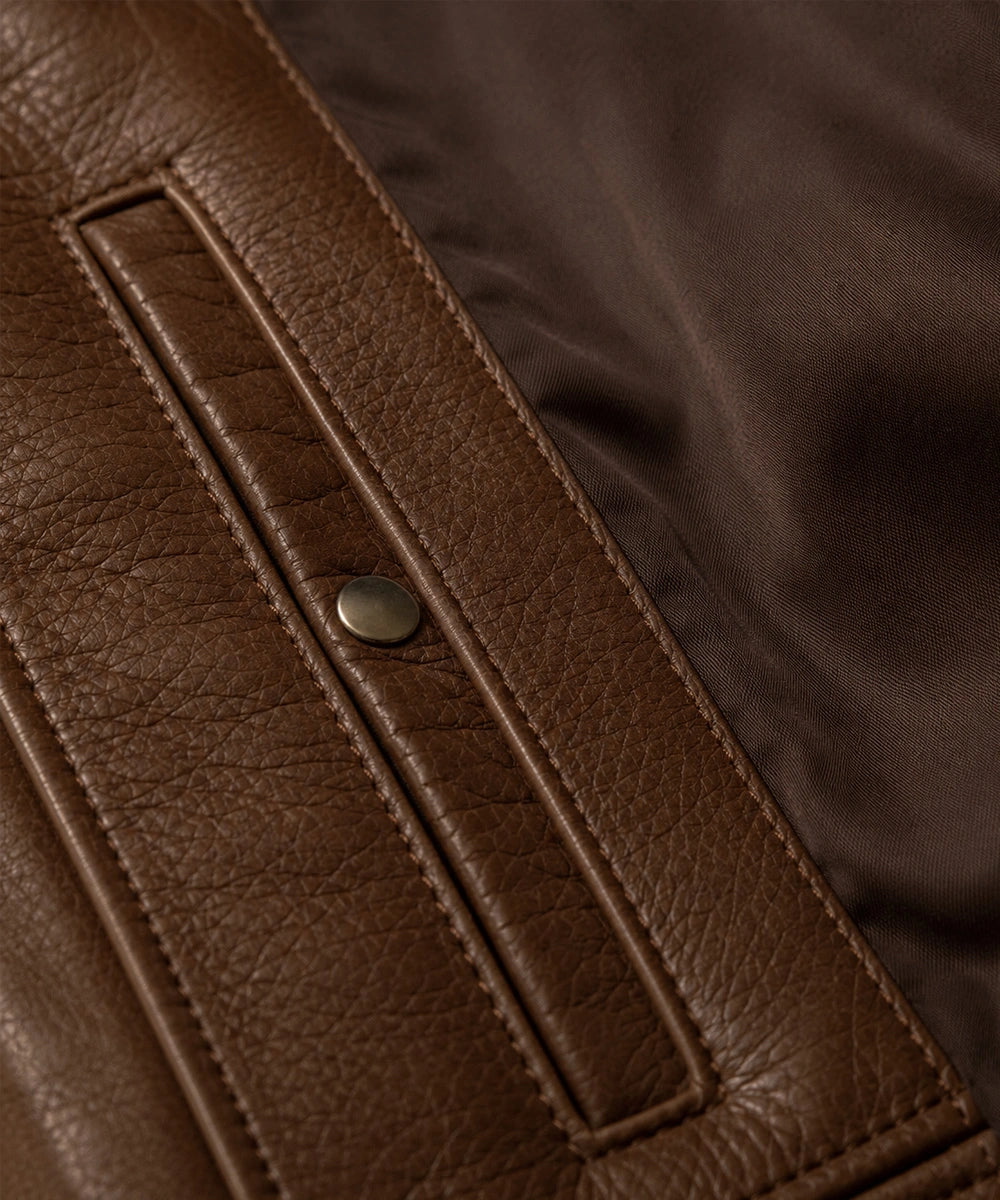 Front view of a men's brown cafe racer leather jacket with stand collar and zip closure