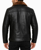 Back view of men’s black sheepskin aviator jacket showing panelled yoke and buckle adjusters