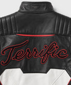 Close-up of Mr Terrific Jacket showing Fair Play inspired details, leather texture, zipper closure, and quality craftsmanship.