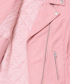 Women's pink leather jacket showing the interior pocket and removable zip-out liner for convenient storage and everyday riding comfort.