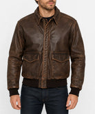 Front view of a vintage leather pilot jacket with a front zipper and classic collar